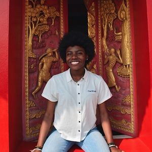 Shirt: white button up. “Heartbreaker”